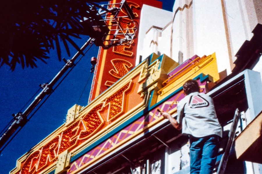 Image of the 1985 Crest Theater marquee being worked on