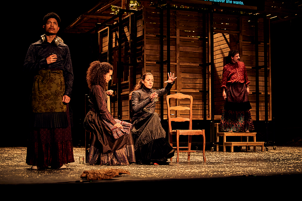 performers on stage in dramatic moment for "Catarina and the beauty of killing fascists"