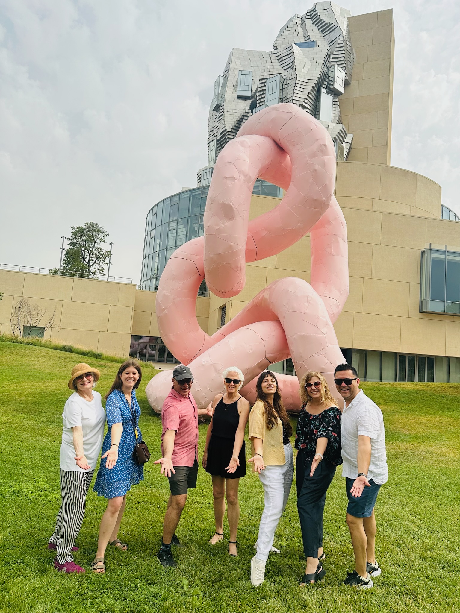 The Avignon travel group in front of The Tower designed by Frank Gehry at the LUMA Foundation in Arles, France.