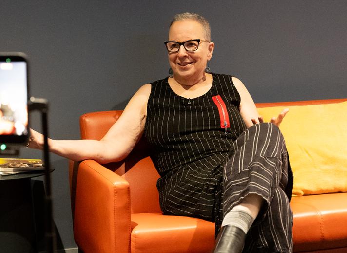 CAP UCLA member Sharon Kagan sitting in the upper lounge of the UCLA Nimoy Theater