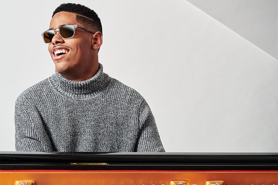 Matthew Whitaker caught in a joyous moment playing the piano