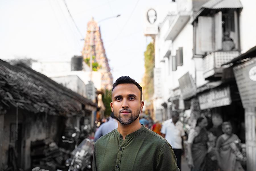 Image of Aditya Prakash standing in middle of crowded street