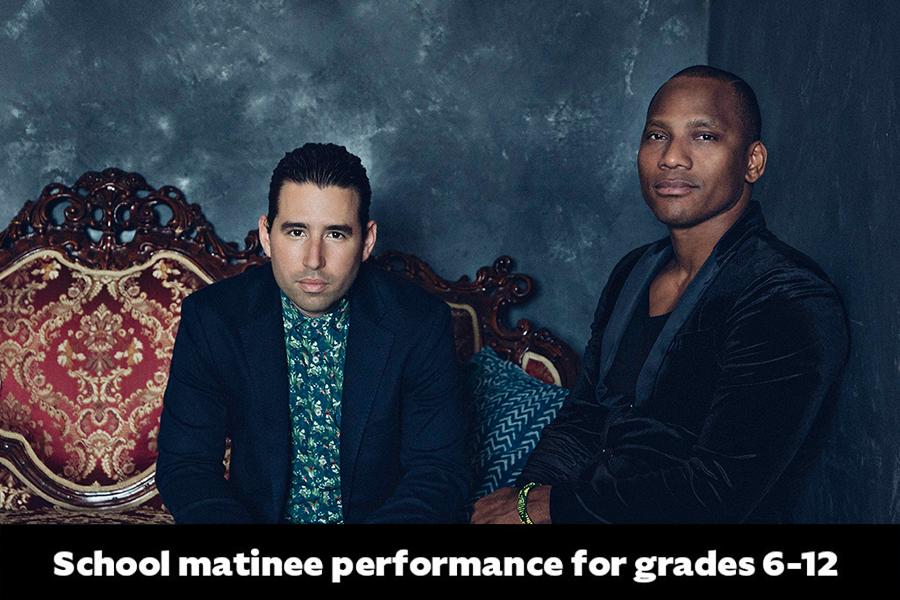 Alfredo Rodriguez and Pedrito Martinez pose together for photo with antique furniture in background