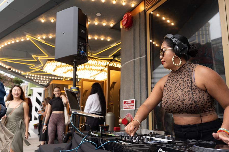 A DJ performs outside of The Nimoy theater