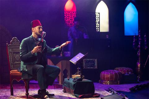 'The Little Syria Show' performed on small stage with purple lighting