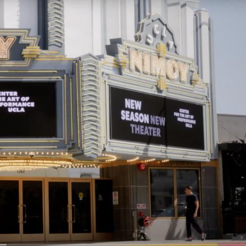 Zachary Quinto walks into The Nimoy theater in a photo taken across the street from the theater