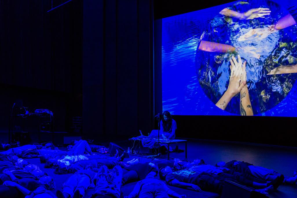 Artist Paige Emery on stage 