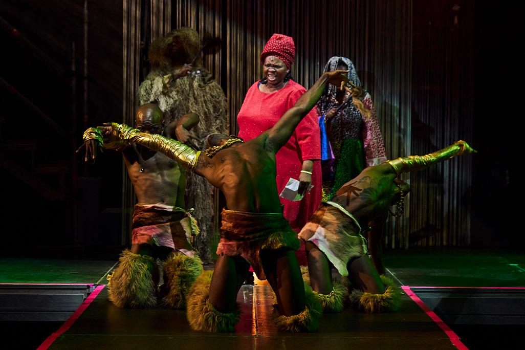 Performers pose on stage in a still from 'Nkoli: A Fierce and Fabulous Life'