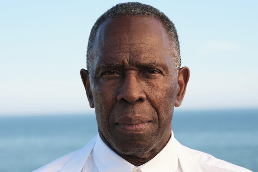 Headshot of Charles Gaines set against the ocean