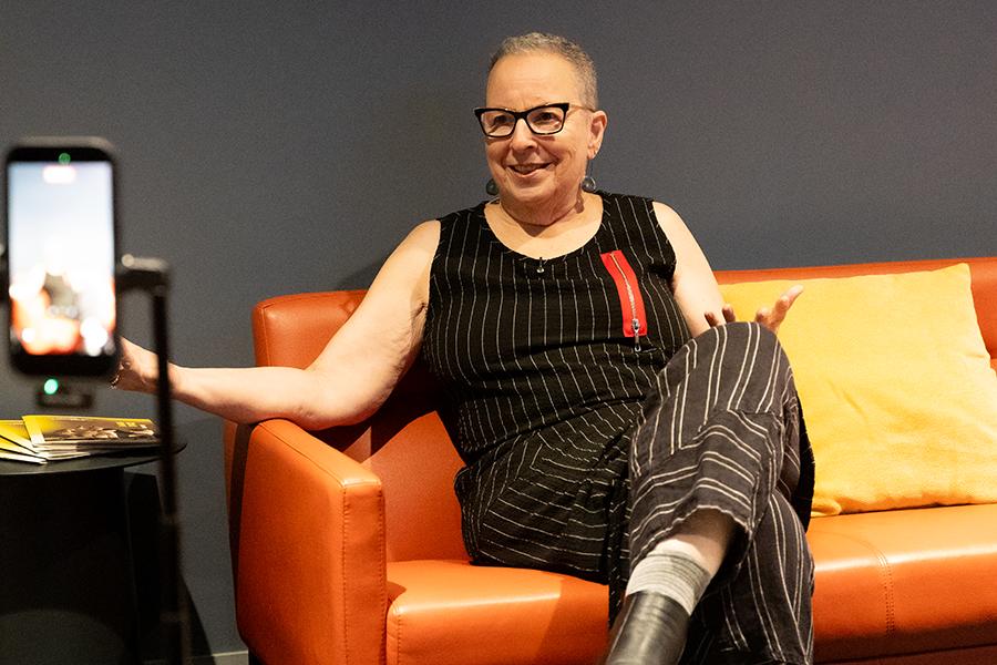 CAP UCLA member Sharon Kagan sitting in the upper lounge of the UCLA Nimoy Theater